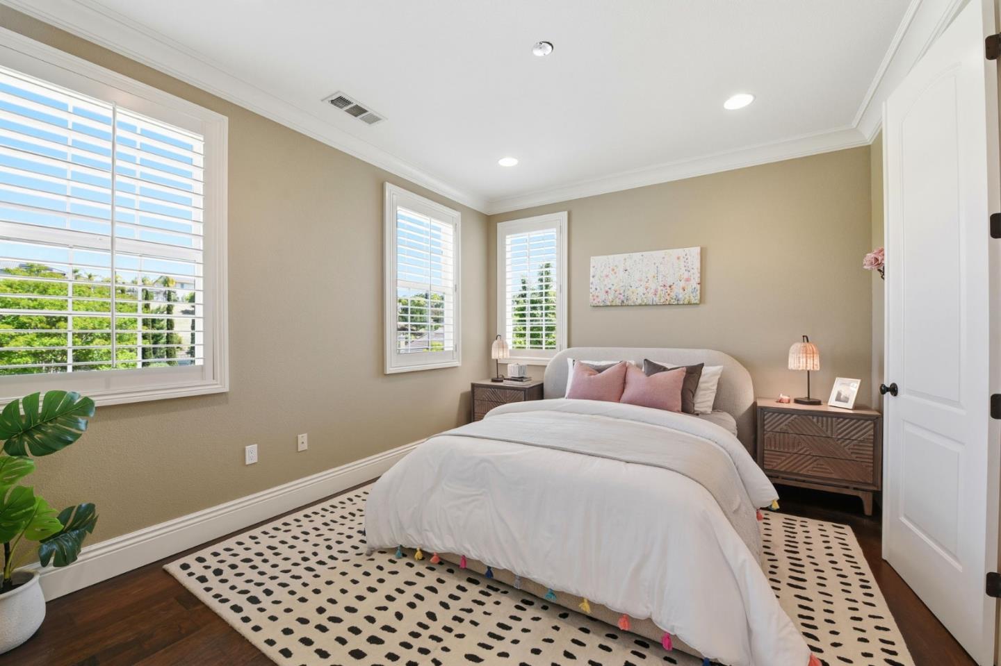2566 Bentley Ridge Drive San Jose, CA 95138 - Photo 57 of 101 a bedroom with a large bed and a window