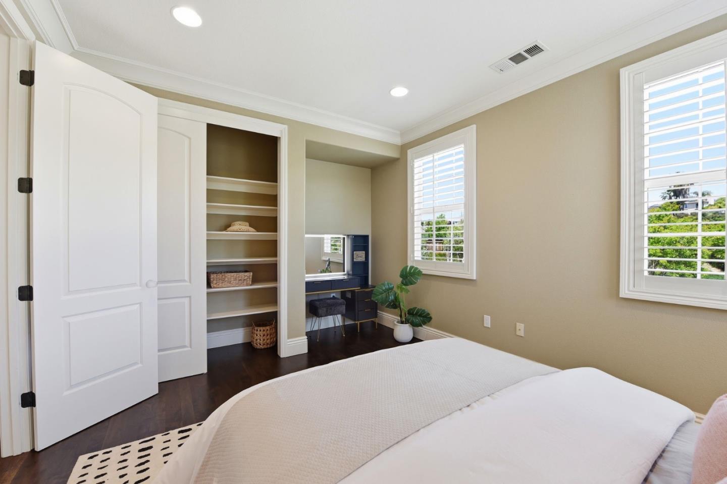 2566 Bentley Ridge Drive San Jose, CA 95138 - Photo 58 of 101 a bedroom with a bed and a window