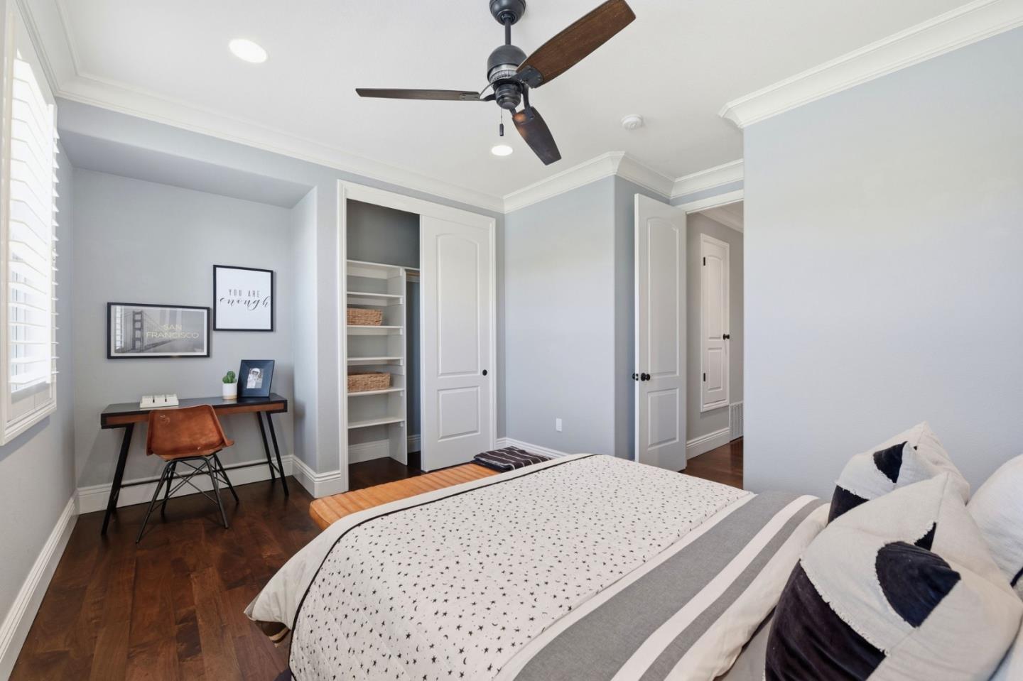 2566 Bentley Ridge Drive San Jose, CA 95138 - Photo 63 of 101 a bedroom with a bed and a chair