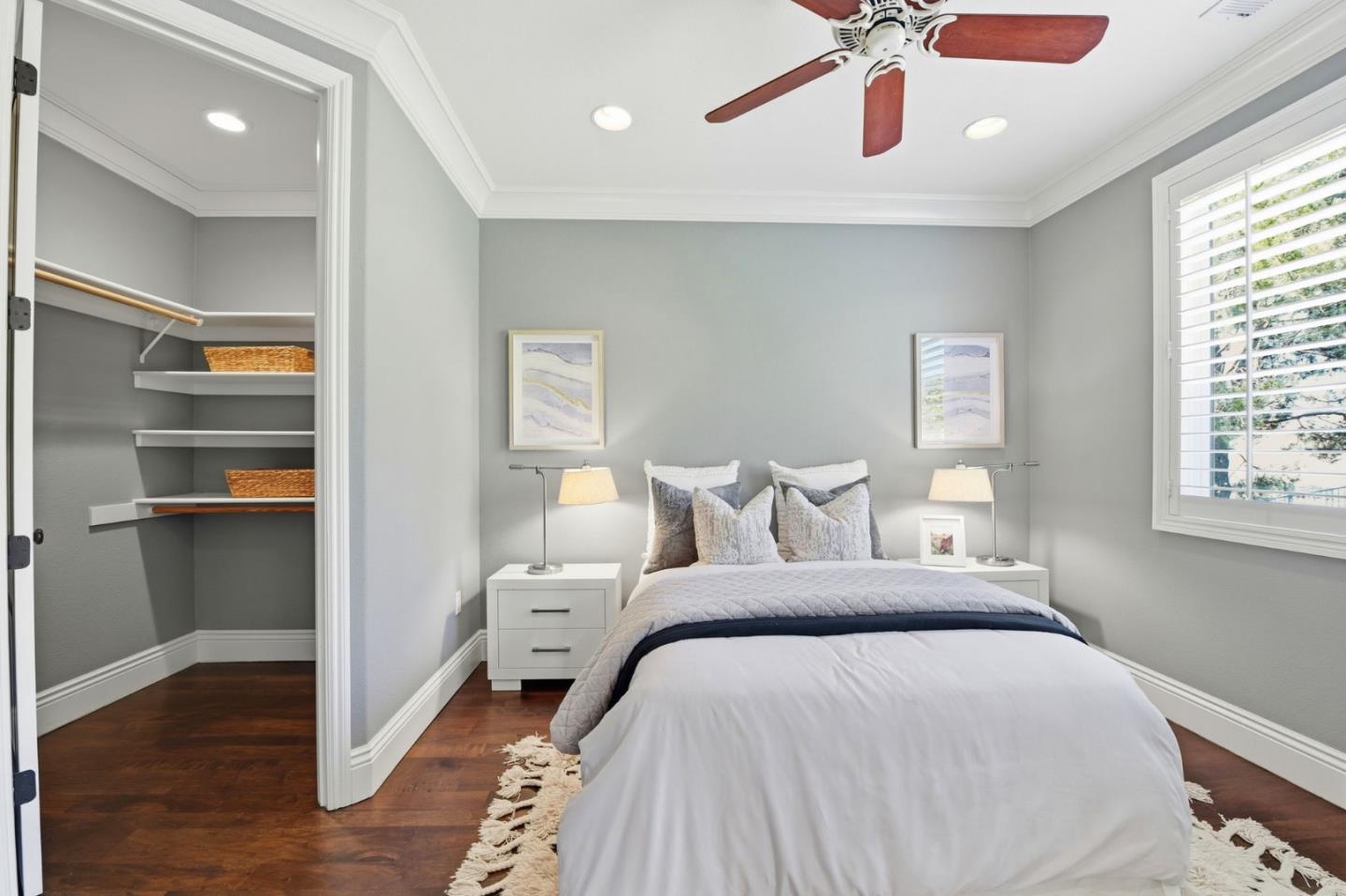 2566 Bentley Ridge Drive San Jose, CA 95138 - Photo 64 of 101 a bedroom with a bed and wooden floor