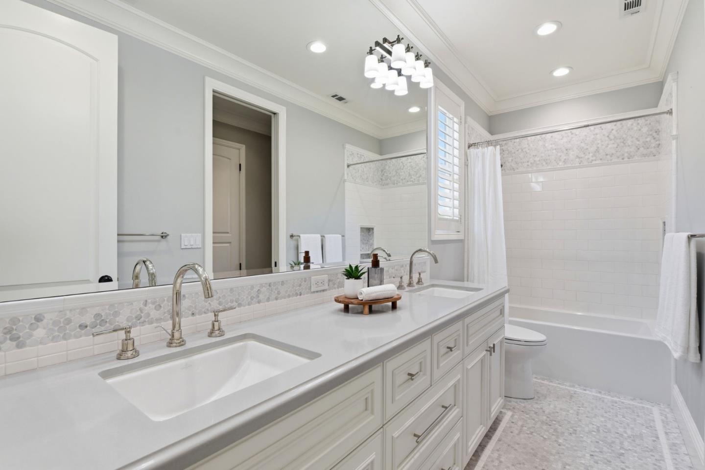 2566 Bentley Ridge Drive San Jose, CA 95138 - Photo 65 of 101 a bathroom with a double vanity sink mirror and toilet