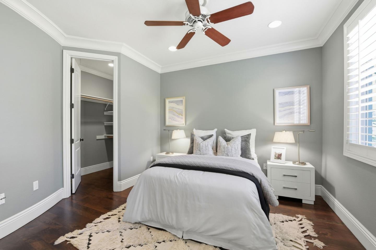 2566 Bentley Ridge Drive San Jose, CA 95138 - Photo 66 of 101 a bedroom with a bed and a chandelier