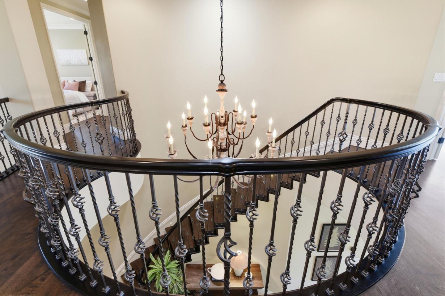 2566 Bentley Ridge Drive San Jose, CA 95138 - Photo 69 of 101 a view of staircase with black and white wooden floor