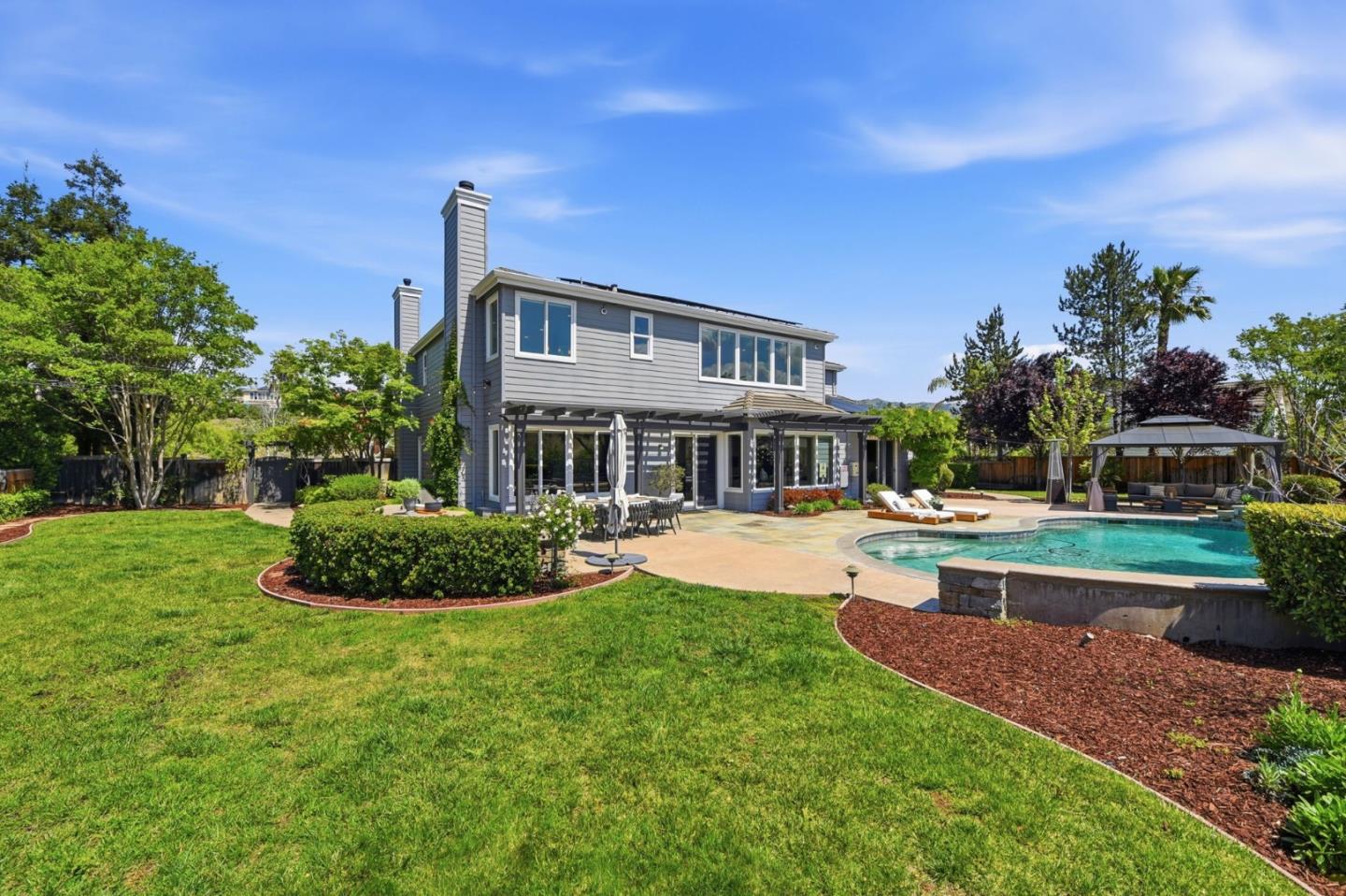 2566 Bentley Ridge Drive San Jose, CA 95138 - Photo 88 of 101 a front view of a house with swimming pool having outdoor seating