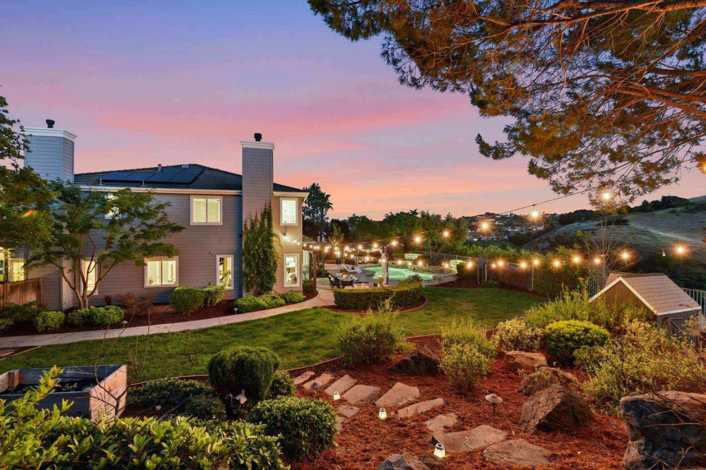 2566 Bentley Ridge Drive San Jose, CA 95138 - Photo 95 of 101 a view of a lake with a house in the background