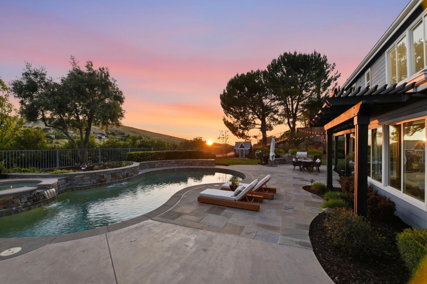 2566 Bentley Ridge Drive San Jose, CA 95138 - Photo 99 of 101 a swimming pool with outdoor seating and plants