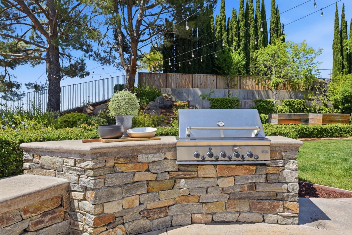 2566 Bentley Ridge Drive San Jose, CA 95138 - Photo 10 of 101 a view of a house with a yard and sitting area