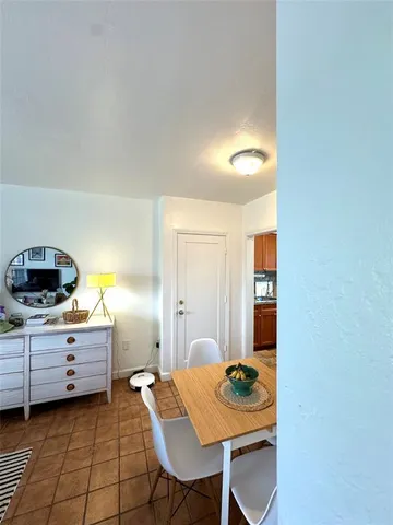 a workspace with furniture and window