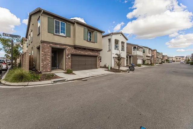 a view of a building with a street