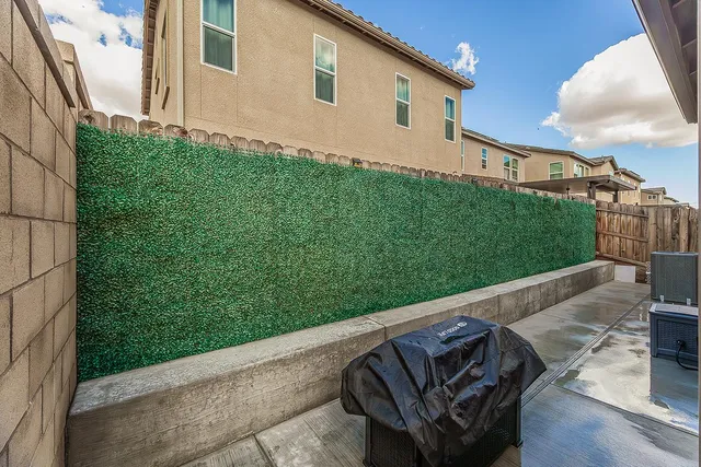 a view of a couches in the backyard of the house