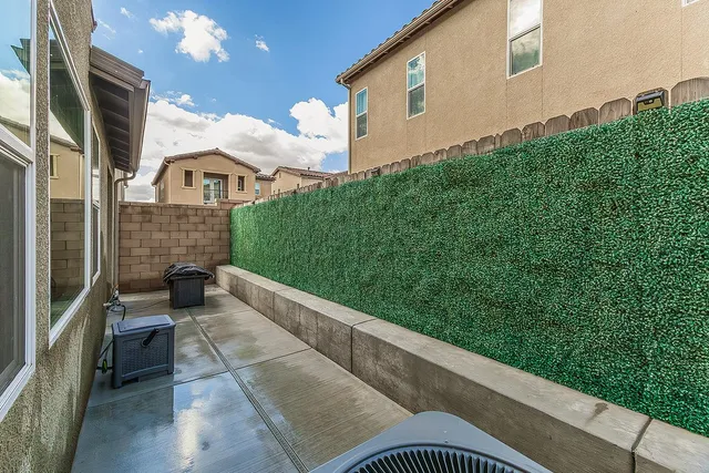 a view of a house with a back yard