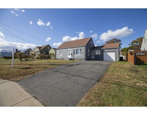 302 Island Pond Road Springfield, MA 01118 - Photo 2 of 25 a view of a building with a yard