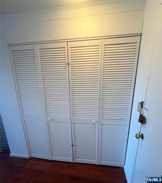 265 Main Street, Unit 506 Ridgefield Park, NJ 07660 - Photo 5 of 8 a view of a room with wooden floor