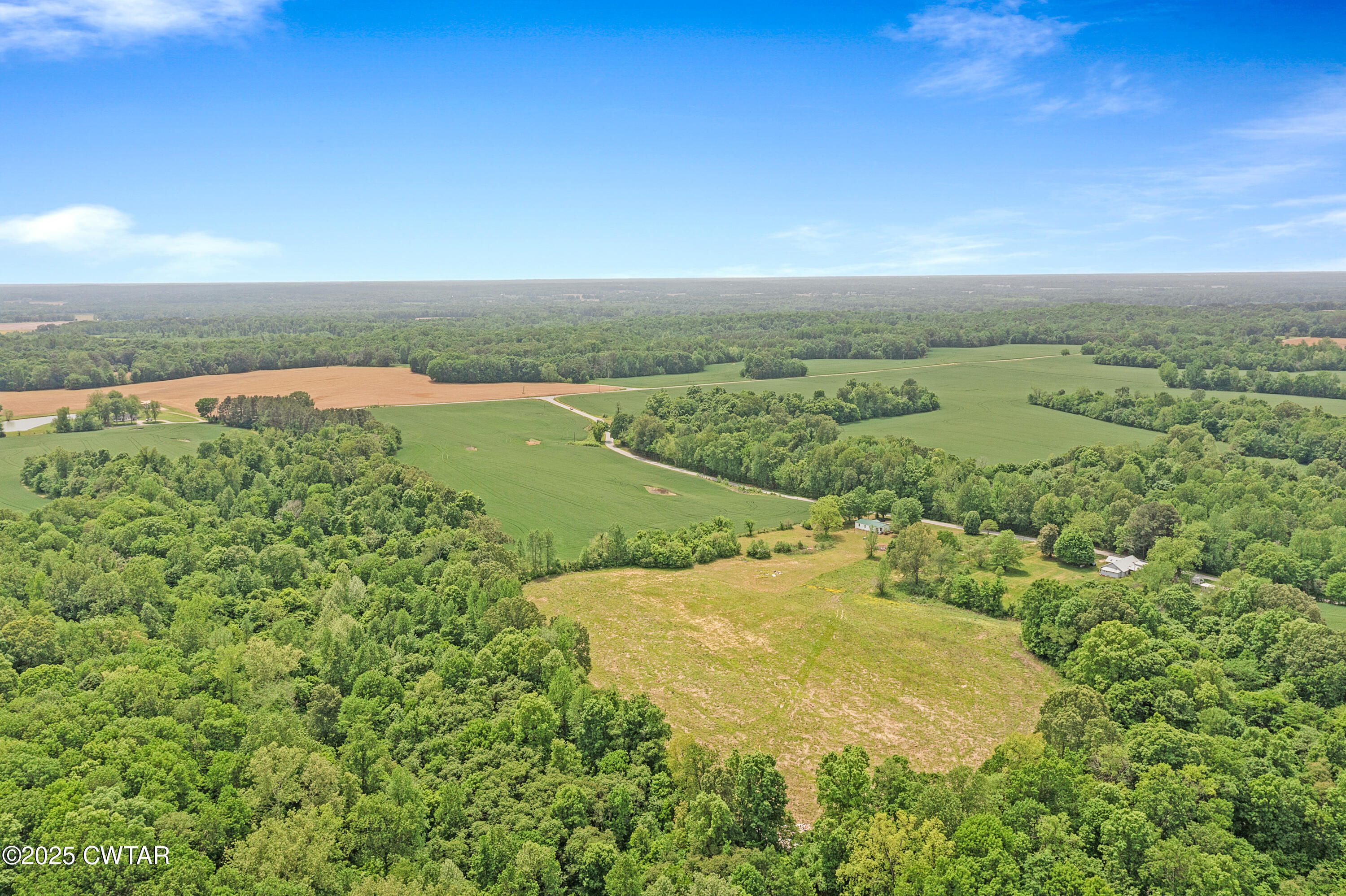 713 Caudle Store Road Greenfield, TN 38230 - Photo 14 of 28 an aerial view of residential houses with outdoor space and trees