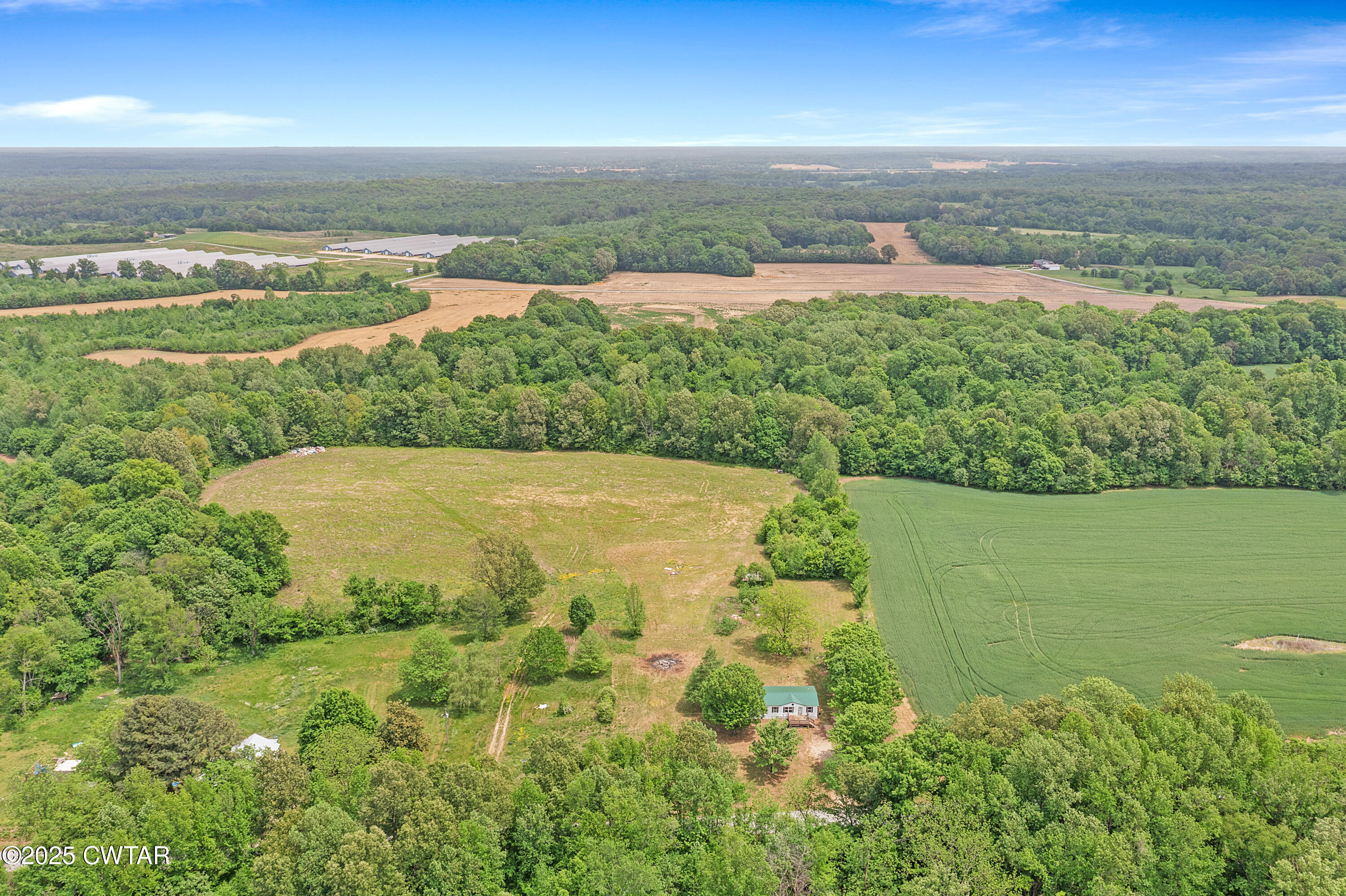 713 Caudle Store Road Greenfield, TN 38230 - Photo 10 of 28 an aerial view of ocean with green space