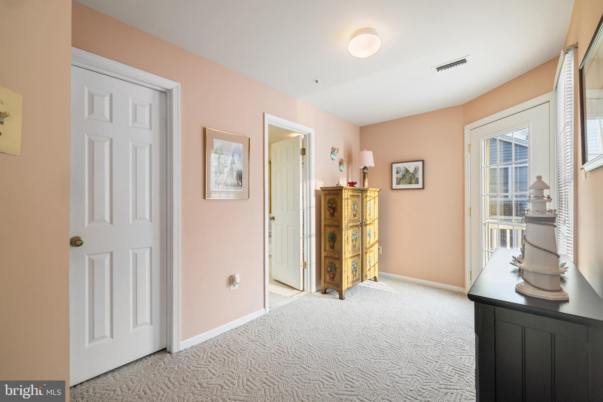 2702 Summerview Way, Unit 303 Annapolis, MD 21401 - Photo 13 of 35 a view of a room with furniture and window