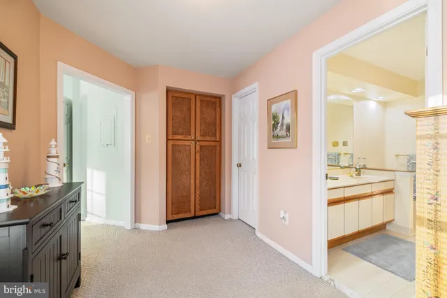 a view of a kitchen cabinets and a wooden floor