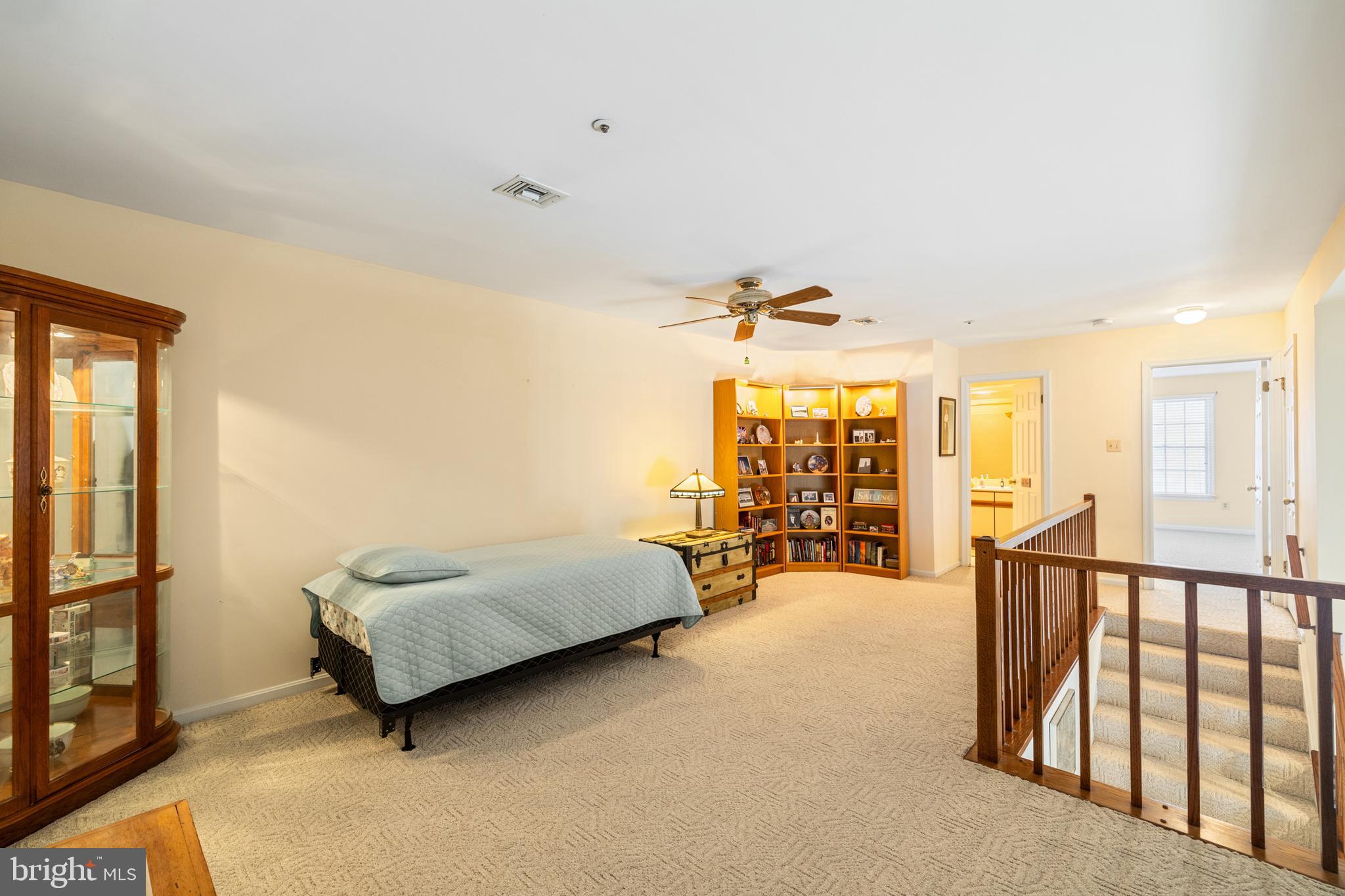 2702 Summerview Way, Unit 303 Annapolis, MD 21401 - Photo 17 of 35 a living room with furniture and a large window