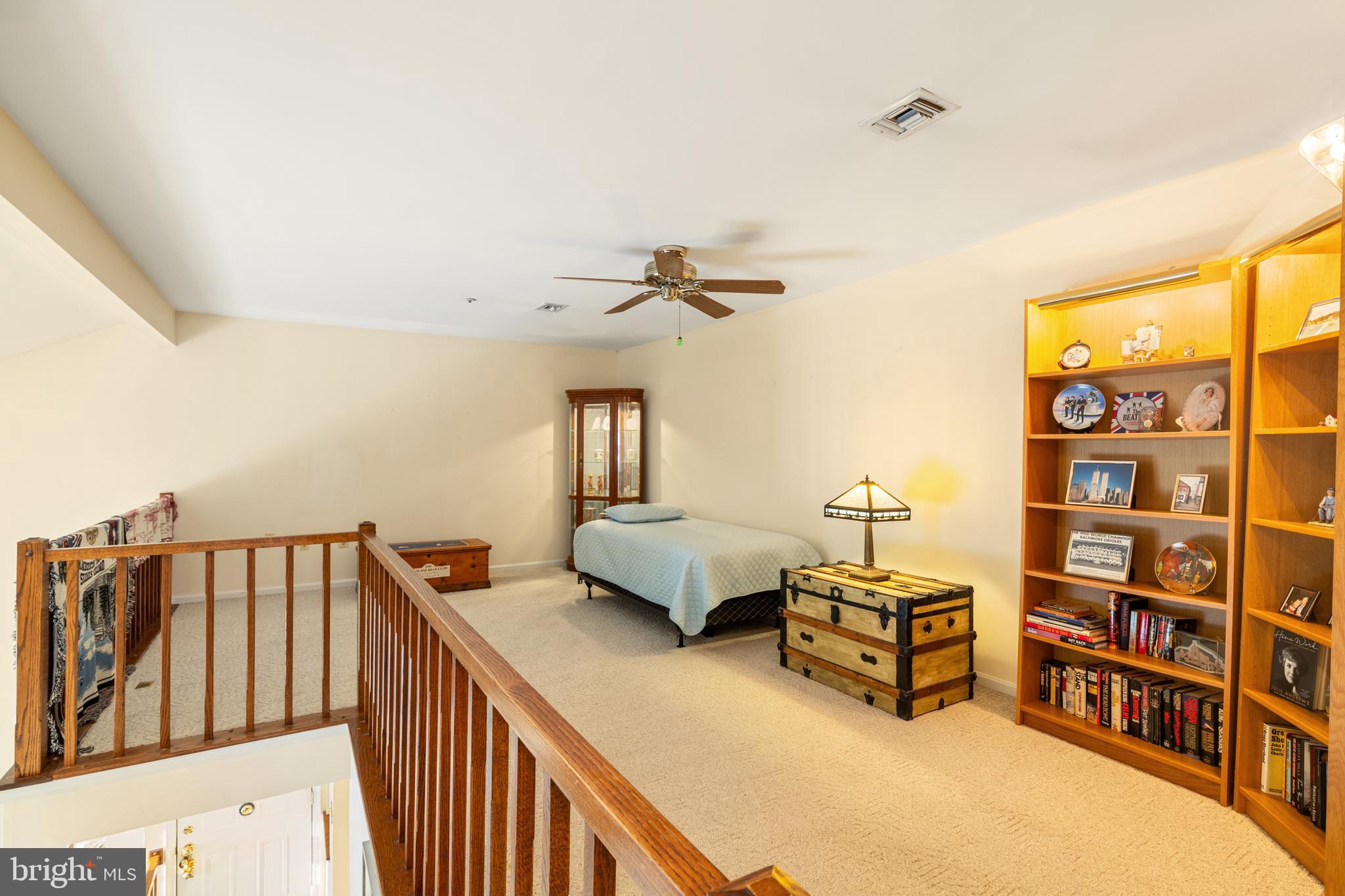 2702 Summerview Way, Unit 303 Annapolis, MD 21401 - Photo 18 of 35 a living room with furniture and a baby crib
