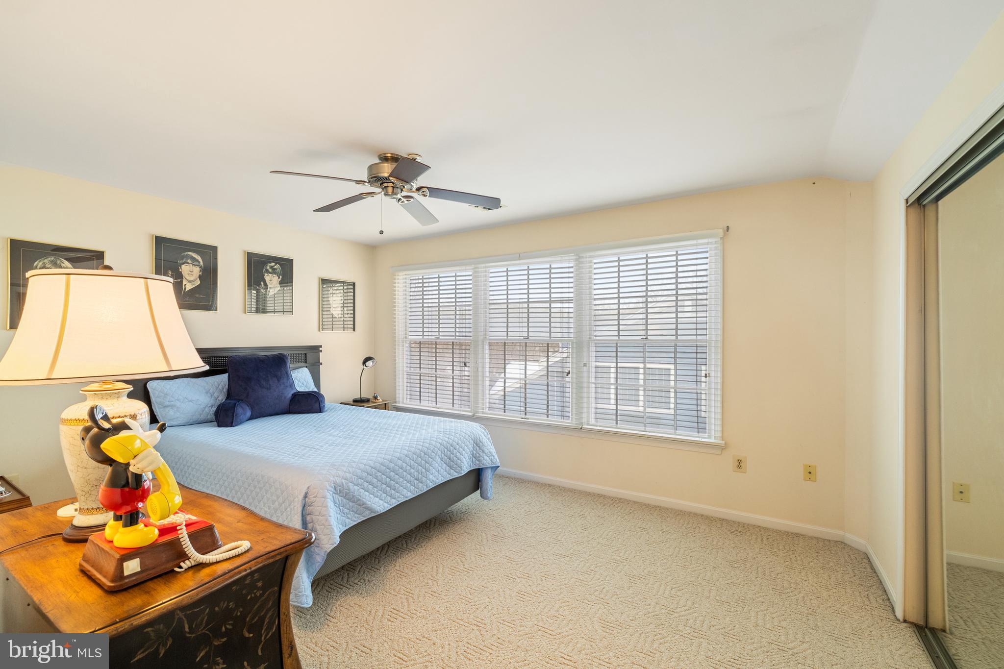 2702 Summerview Way, Unit 303 Annapolis, MD 21401 - Photo 20 of 35 a bedroom with two beds and a window