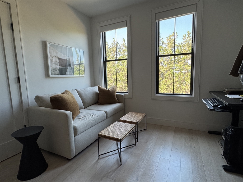 347 Maverick Street, Unit 5 Boston, MA 02128 - Photo 13 of 15 a living room with furniture and a window