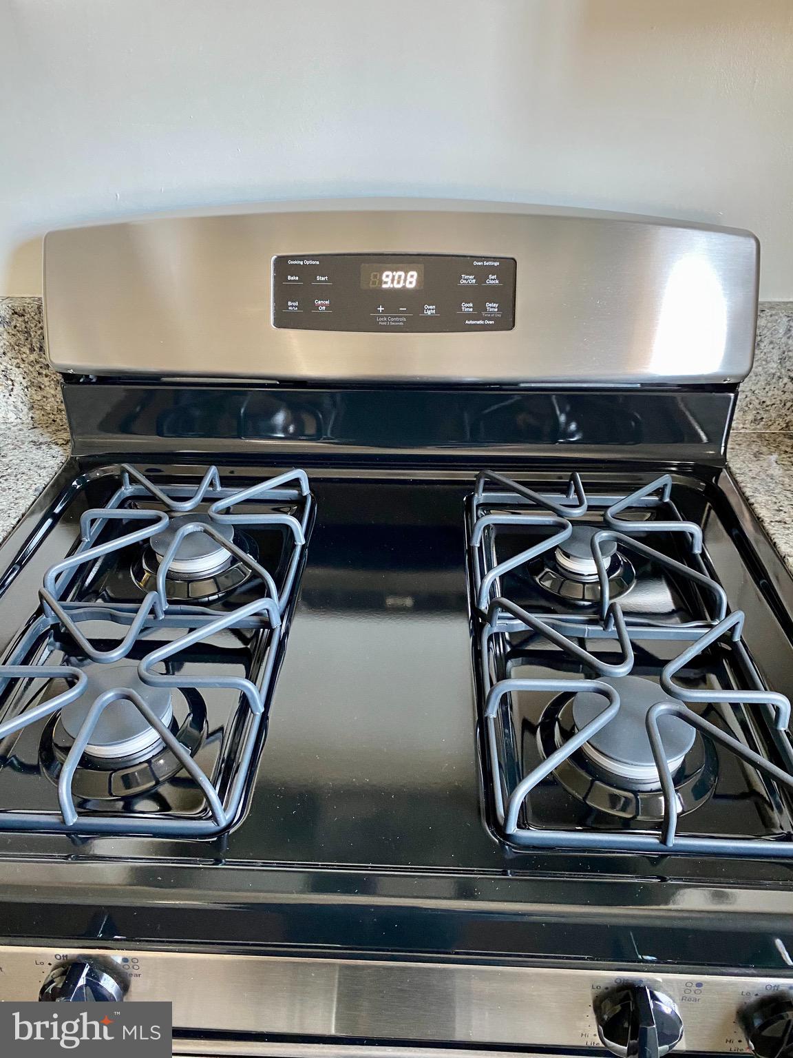 5705 Utrecht Road Baltimore, MD 21206 - Photo 5 of 34 Stainless steel gas stove.