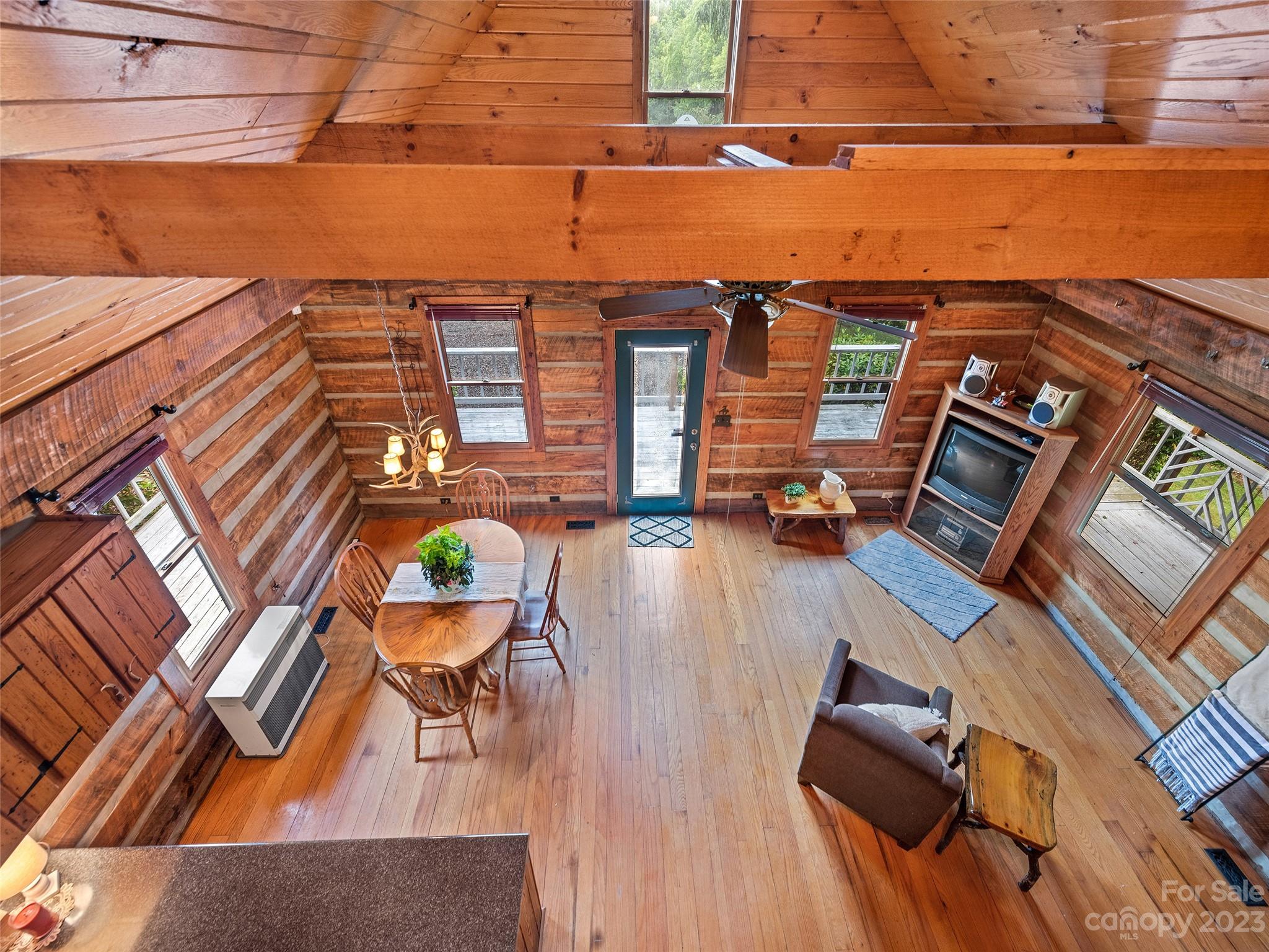 205 Columbus Cove Road Waynesville, NC 28785 - Photo 21 of 33 a view of a balcony with chairs