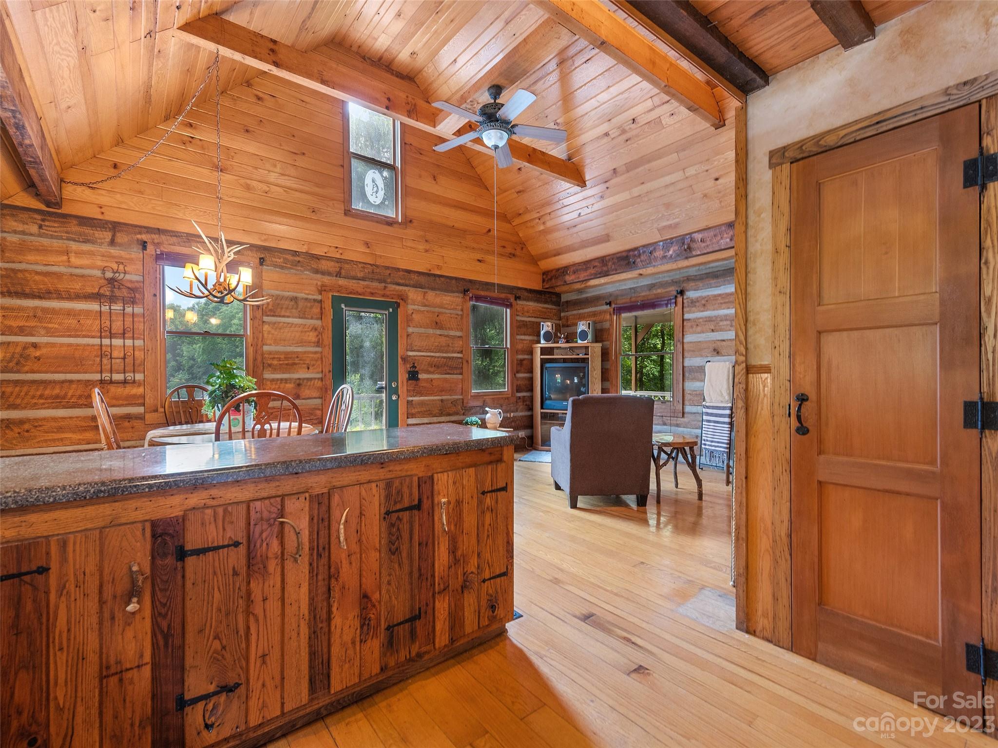 205 Columbus Cove Road Waynesville, NC 28785 - Photo 24 of 33 a view of a chairs and table in the balcony
