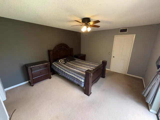 a view of balcony with furniture