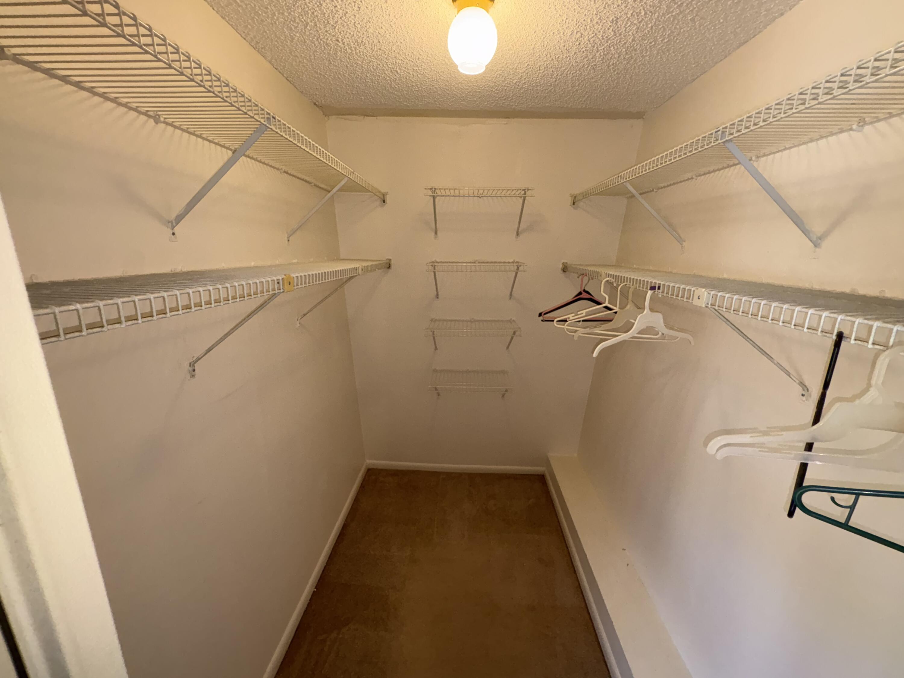 2950 Southwest 22nd Circle, Unit 4A Delray Beach, FL 33445 - Photo 20 of 42 a view of a walk in closet