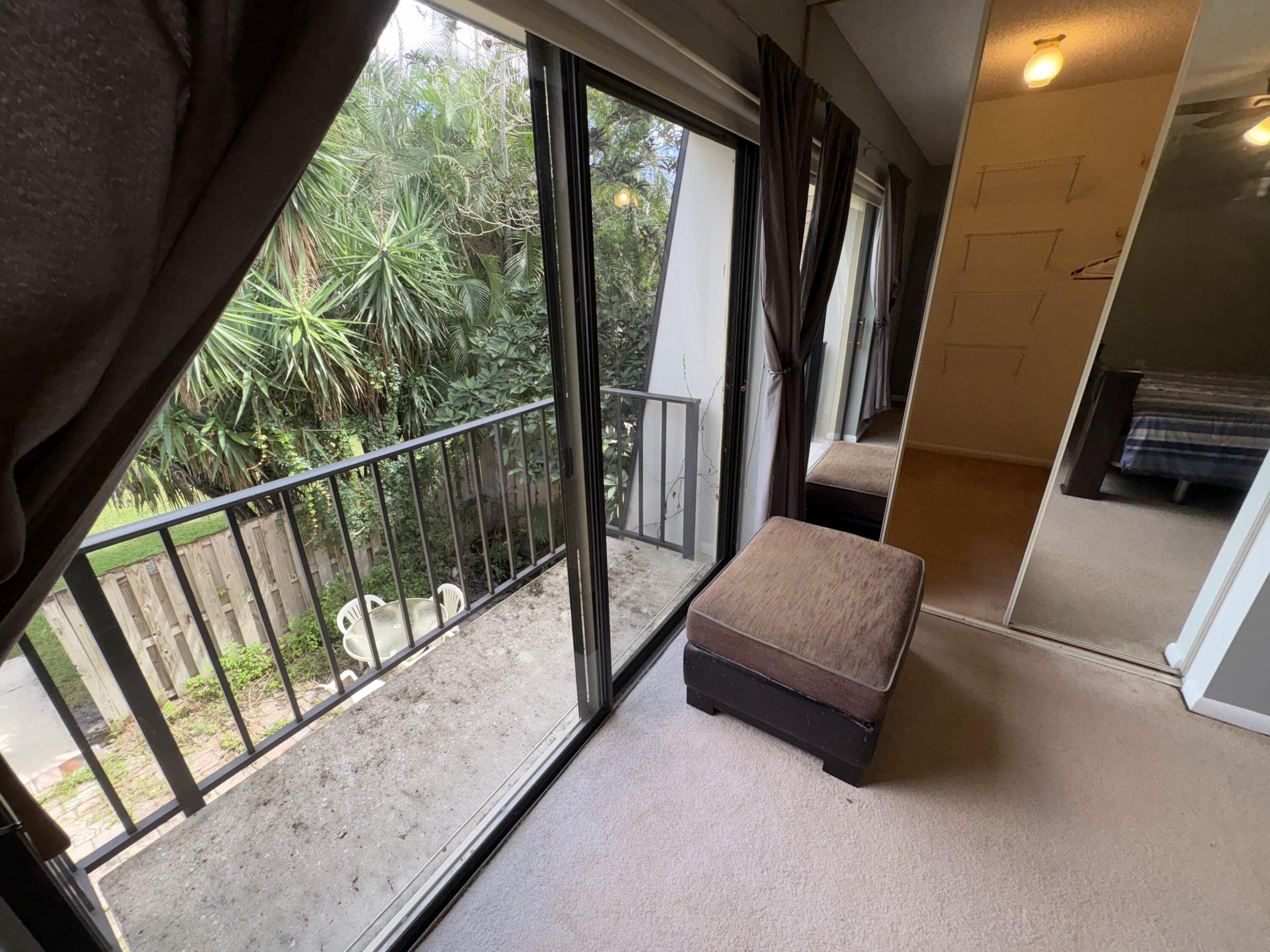 2950 Southwest 22nd Circle, Unit 4A Delray Beach, FL 33445 - Photo 21 of 42 a view of balcony with furniture