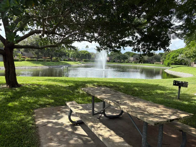a view of a lake with a yard