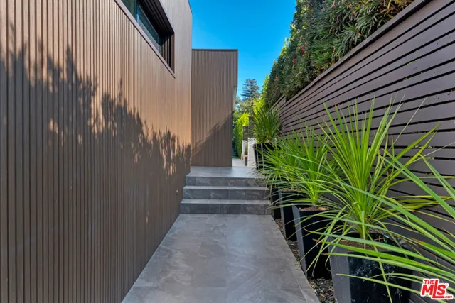 a house view with garden space