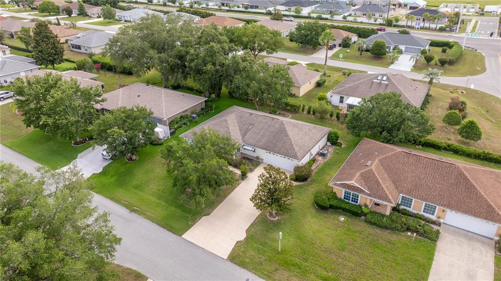 8485 Southwest 60th Circle Ocala, FL 34476 - Photo 5 of 22 an aerial view of a house with a garden