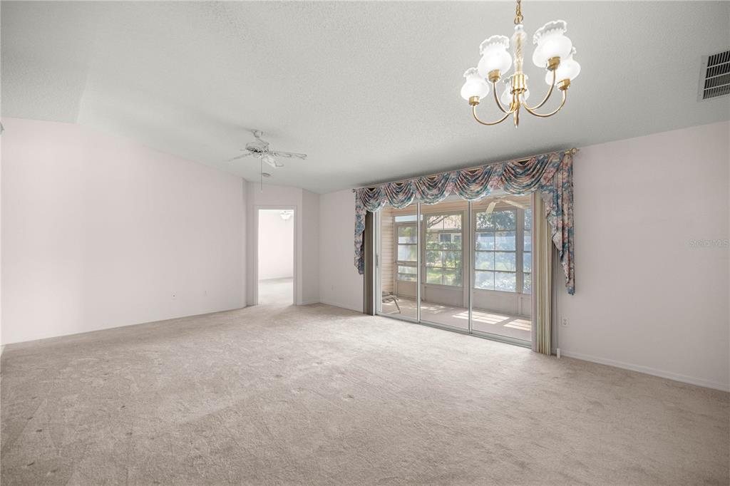 8485 Southwest 60th Circle Ocala, FL 34476 - Photo 10 of 22 a view of an empty room with a window