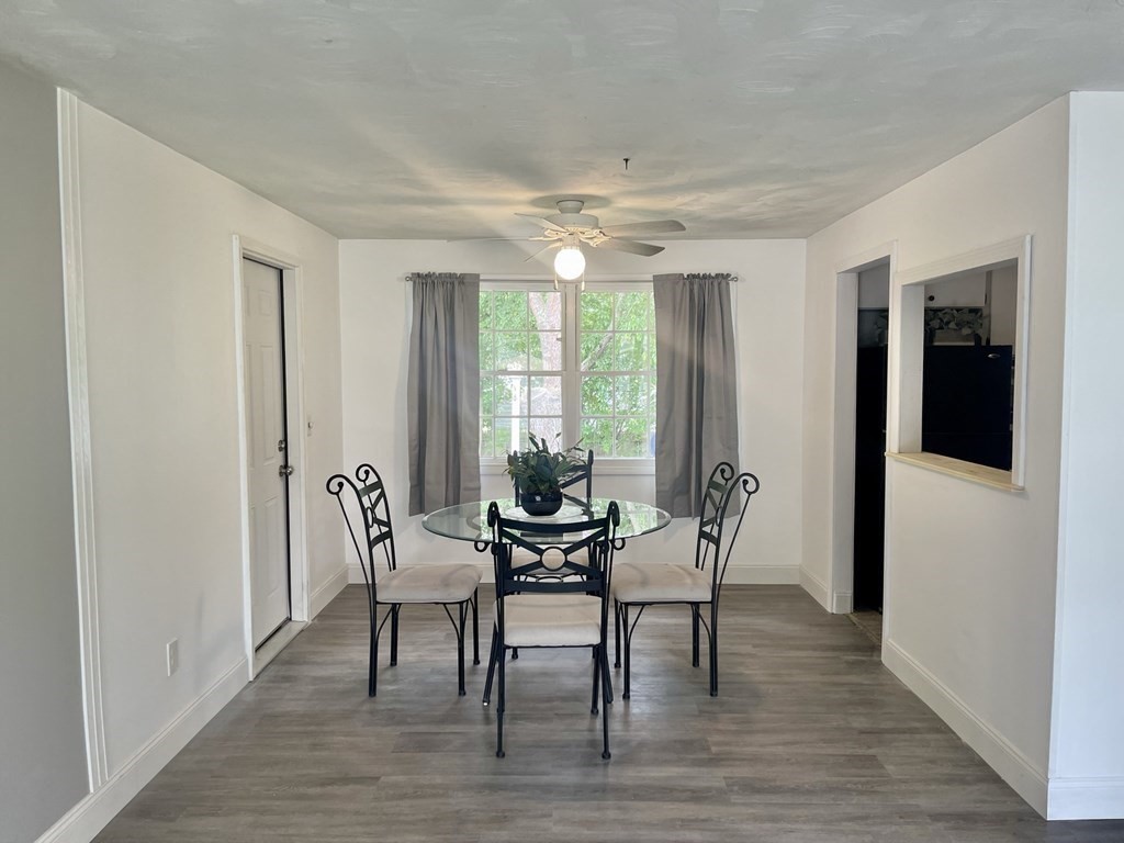 529 Howard Street Brockton, MA 02302 - Photo 12 of 34 a dining room with furniture and wooden floor