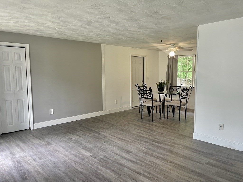 529 Howard Street Brockton, MA 02302 - Photo 13 of 34 a view of dining room with furniture and wooden floor