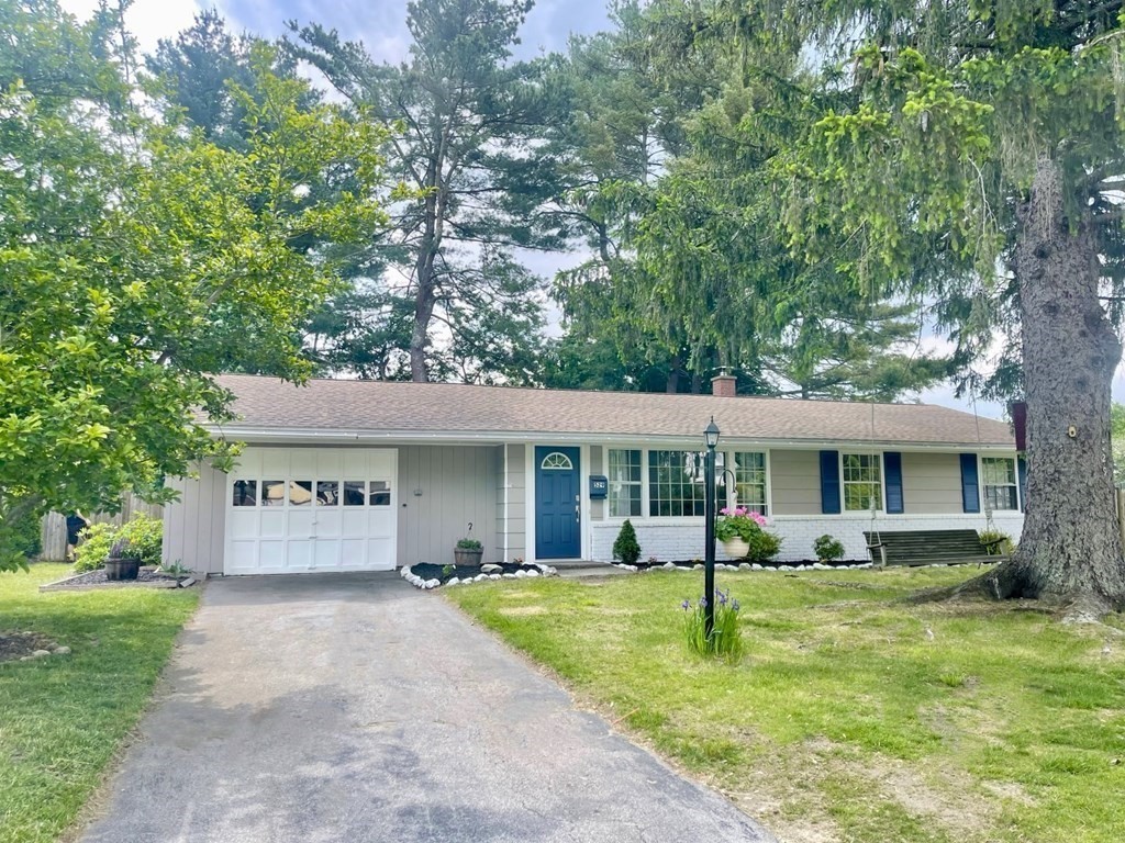 529 Howard Street Brockton, MA 02302 - Photo 3 of 34 a front view of a house with garden