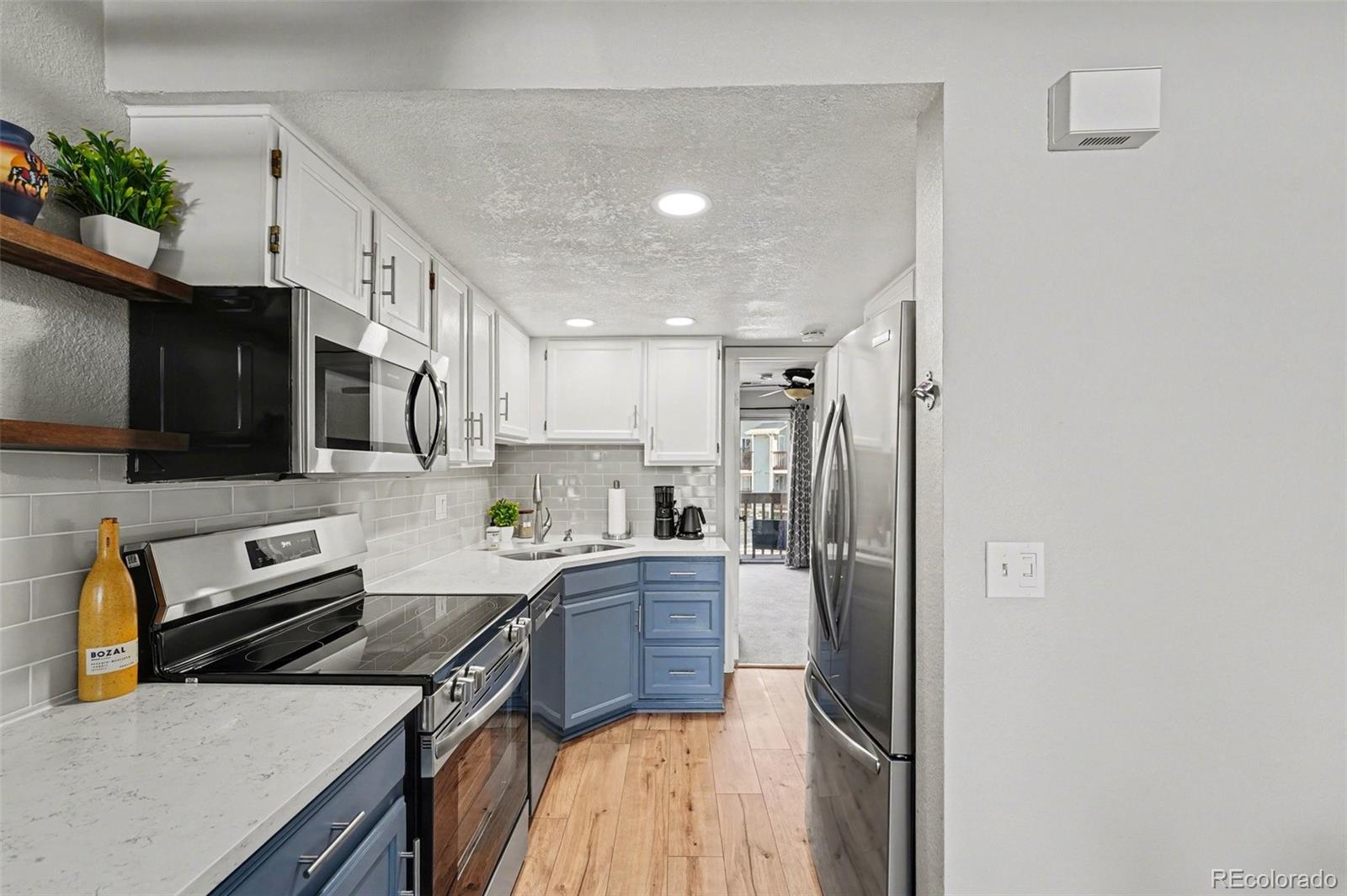 1885 South Quebec Way, Unit B24 Denver, CO 80231 - Photo 4 of 22