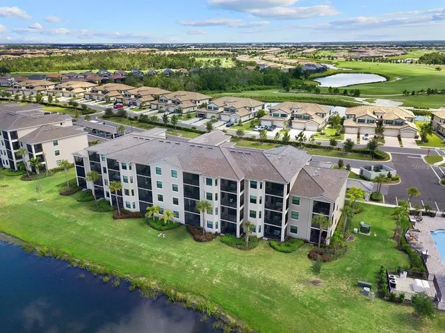 an aerial view of a house with a garden