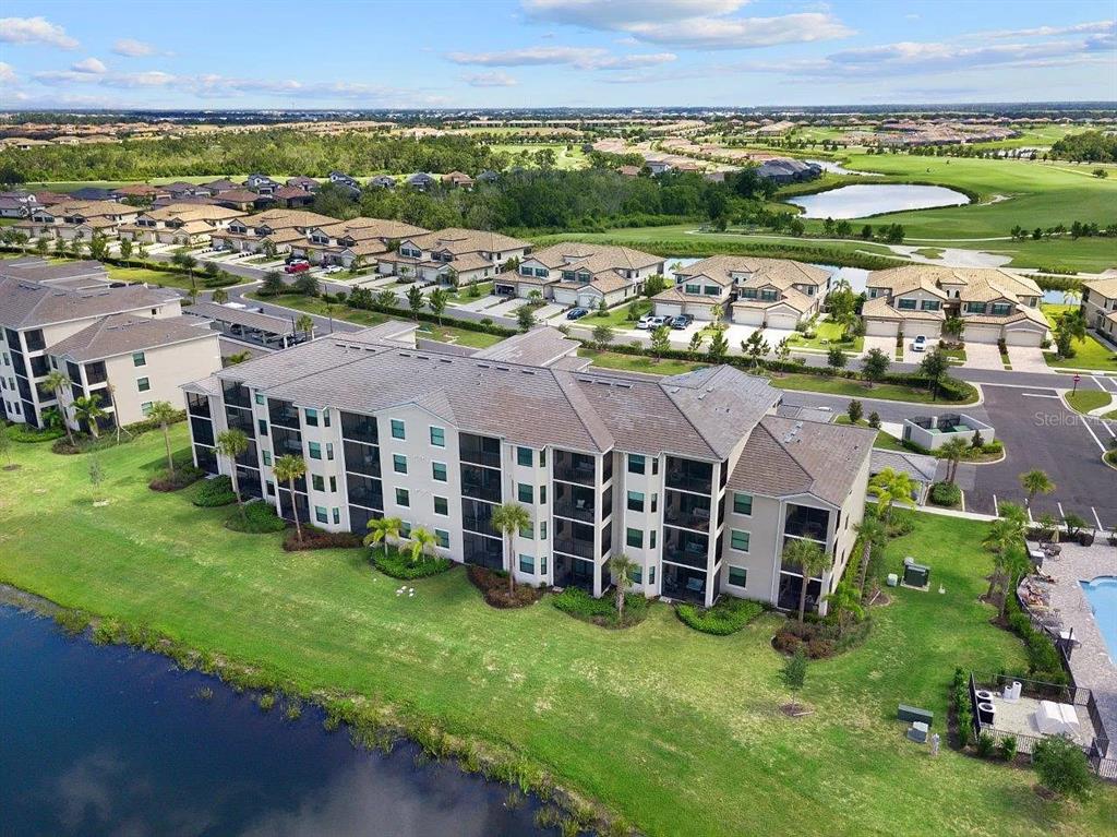 17724 Gawthrop Drive, Unit 204 Bradenton, FL 34211 - Photo 1 of 55 an aerial view of a house with a garden