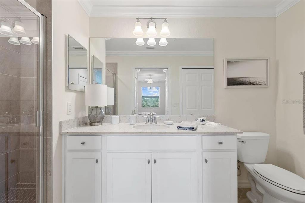 17724 Gawthrop Drive, Unit 204 Bradenton, FL 34211 - Photo 30 of 55 a bathroom with a double vanity sink and a mirror