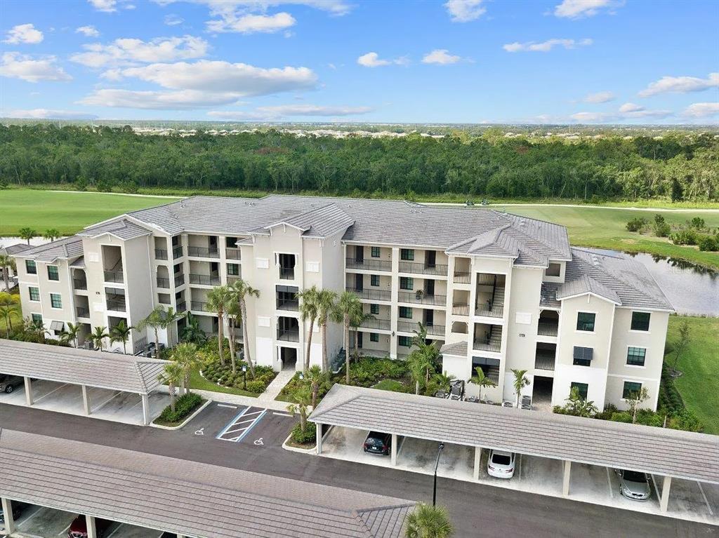 17724 Gawthrop Drive, Unit 204 Bradenton, FL 34211 - Photo 3 of 55 a view of a city with tall buildings