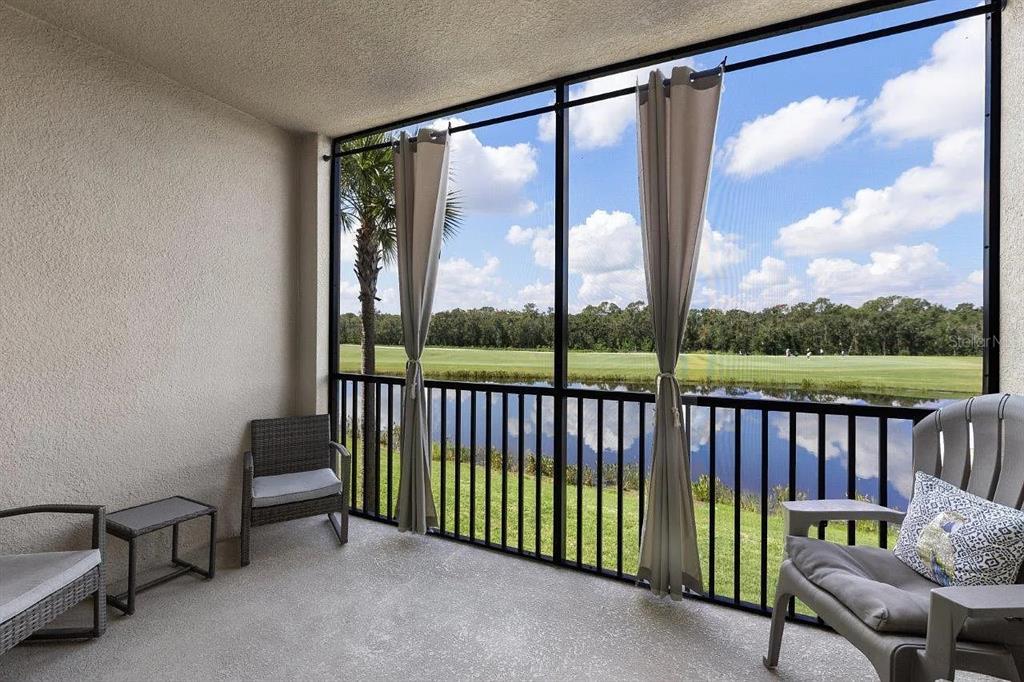 17724 Gawthrop Drive, Unit 204 Bradenton, FL 34211 - Photo 33 of 55 a view of a porch with furniture
