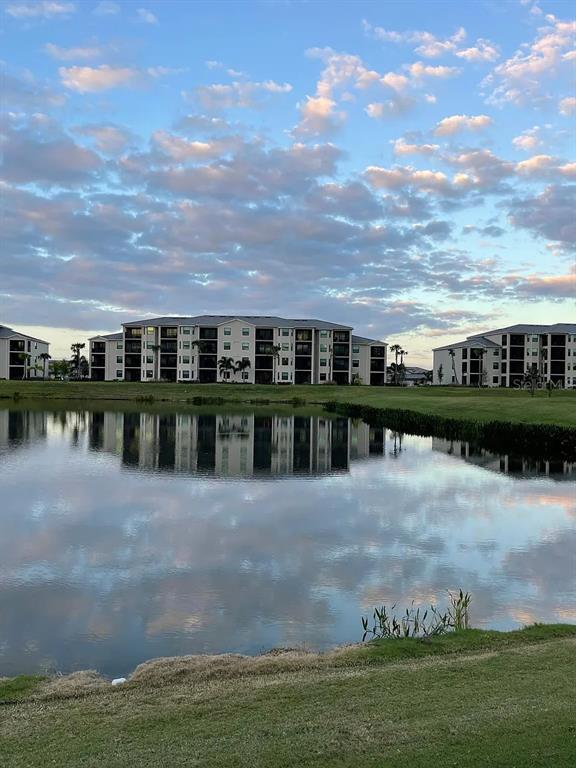 17724 Gawthrop Drive, Unit 204 Bradenton, FL 34211 - Photo 44 of 55 a view of a lake with a big yard