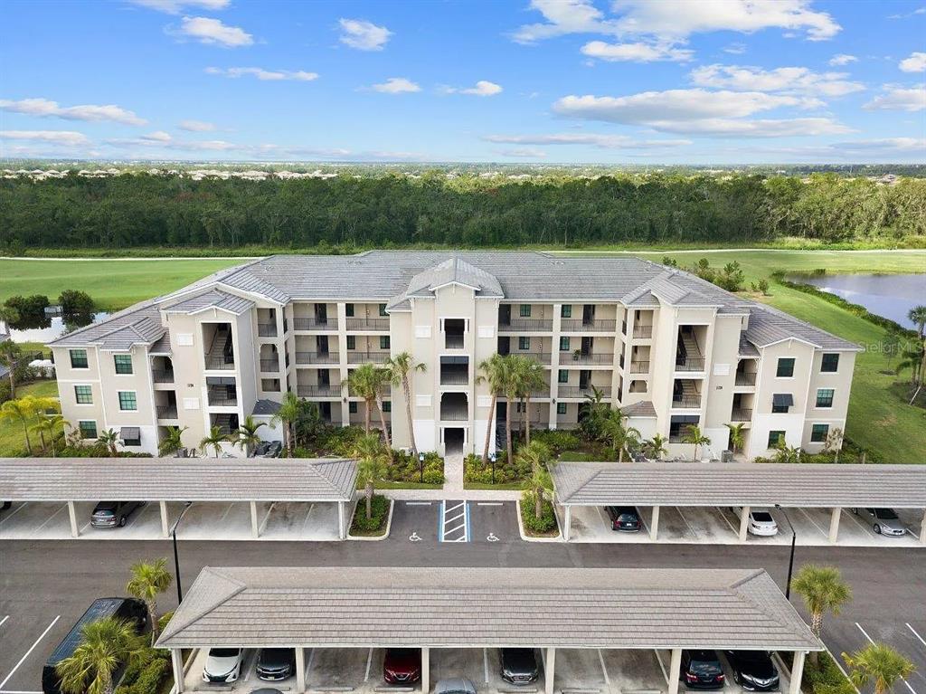 17724 Gawthrop Drive, Unit 204 Bradenton, FL 34211 - Photo 53 of 55 a view of a city with tall buildings