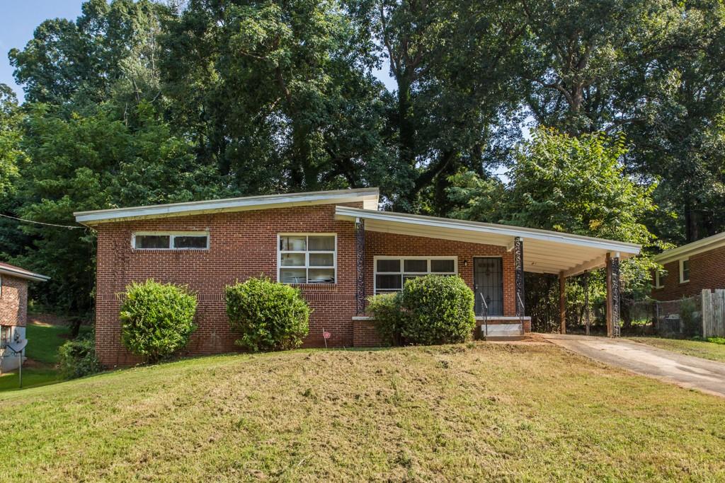 front view of a house with a yard