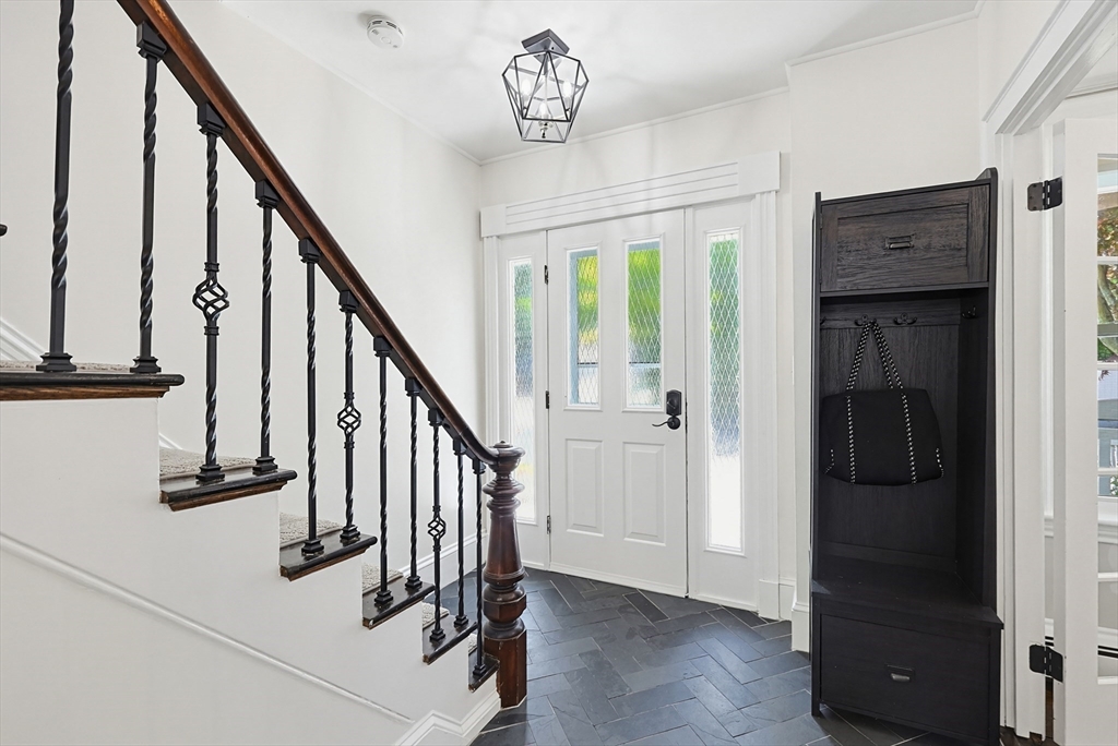 345 Sherman Street Canton, MA 02021 - Photo 16 of 42 a view of entryway with stairs and furniture