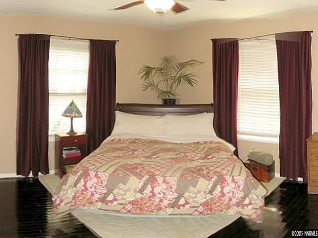 861 Primrose Street Reno, NV 89509 - Photo 8 of 9 a bed sitting in a bedroom next to a window