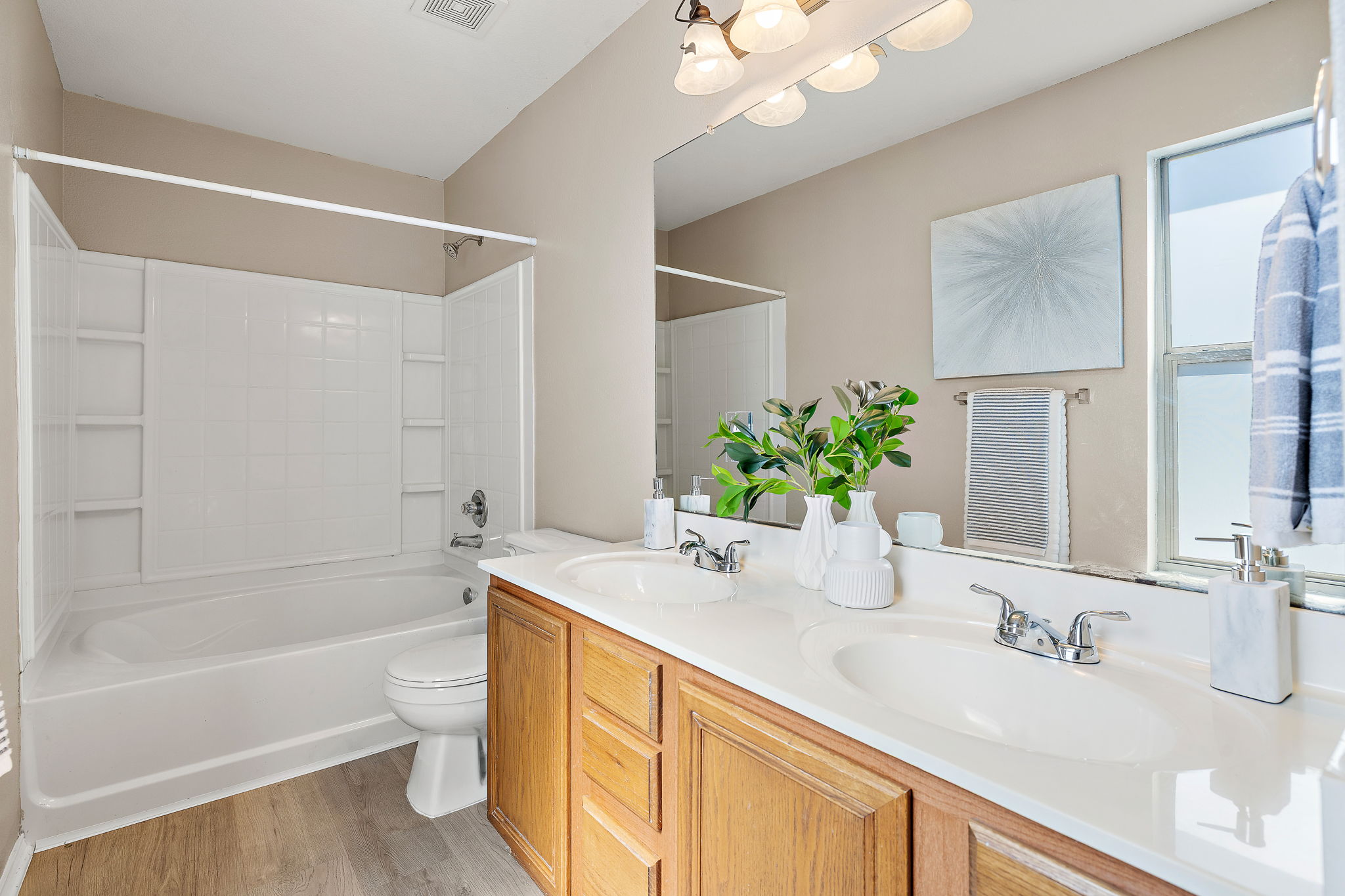 5705 Viewpoint Drive Austin, TX 78744 - Photo 19 of 30 Dual vanities help make busy mornings a little less hectic.